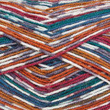 Close up of self striping yarn color red orange green blue white