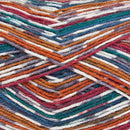Close up of self striping yarn color red orange green blue white