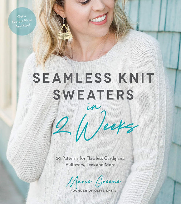 Woman wearing a white sweater with text about seamless knit sweaters and a brand logo.