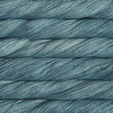 close up view of malabrigo silkpaca lace weight yarn color blue