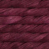 close up view of malabrigo silkpaca lace weight yarn color red