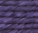 close up view of malabrigo silkpaca lace weight yarn color purple