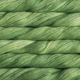 close up view of malabrigo silkpaca lace weight yarn color green