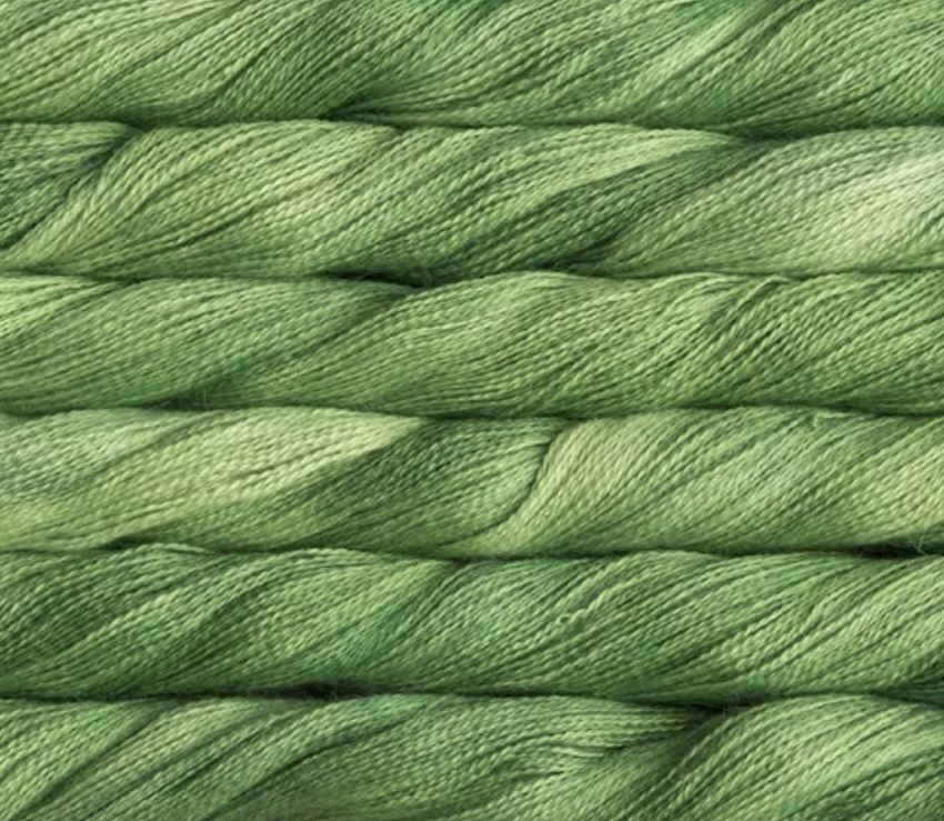 close up view of malabrigo silkpaca lace weight yarn color green