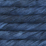 close up view of malabrigo silkpaca lace weight yarn color blue