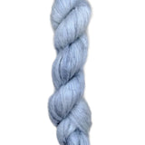 Skein of superkid mohair silk lace weight yarn color icy blue