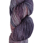 a skein of wool yarn in the color grey denim purple and coral