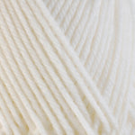Detailed view of a skein of superwash wool yarn, showcasing a white hue.