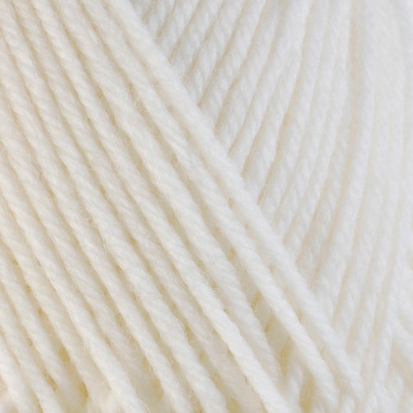 Detailed view of a skein of superwash wool yarn, showcasing a white hue.