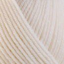 Detailed view of a skein of superwash wool yarn, showcasing a white hue.