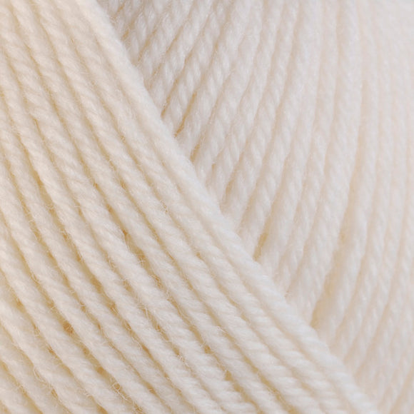 Detailed view of a skein of superwash wool yarn, showcasing a white hue.