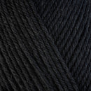 Detailed view of a skein of superwash wool yarn, showcasing a black hue.
