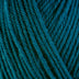Detailed view of a skein of superwash wool yarn, showcasing a teal hue.