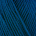 Detailed view of a skein of superwash wool yarn, showcasing a blue hue.