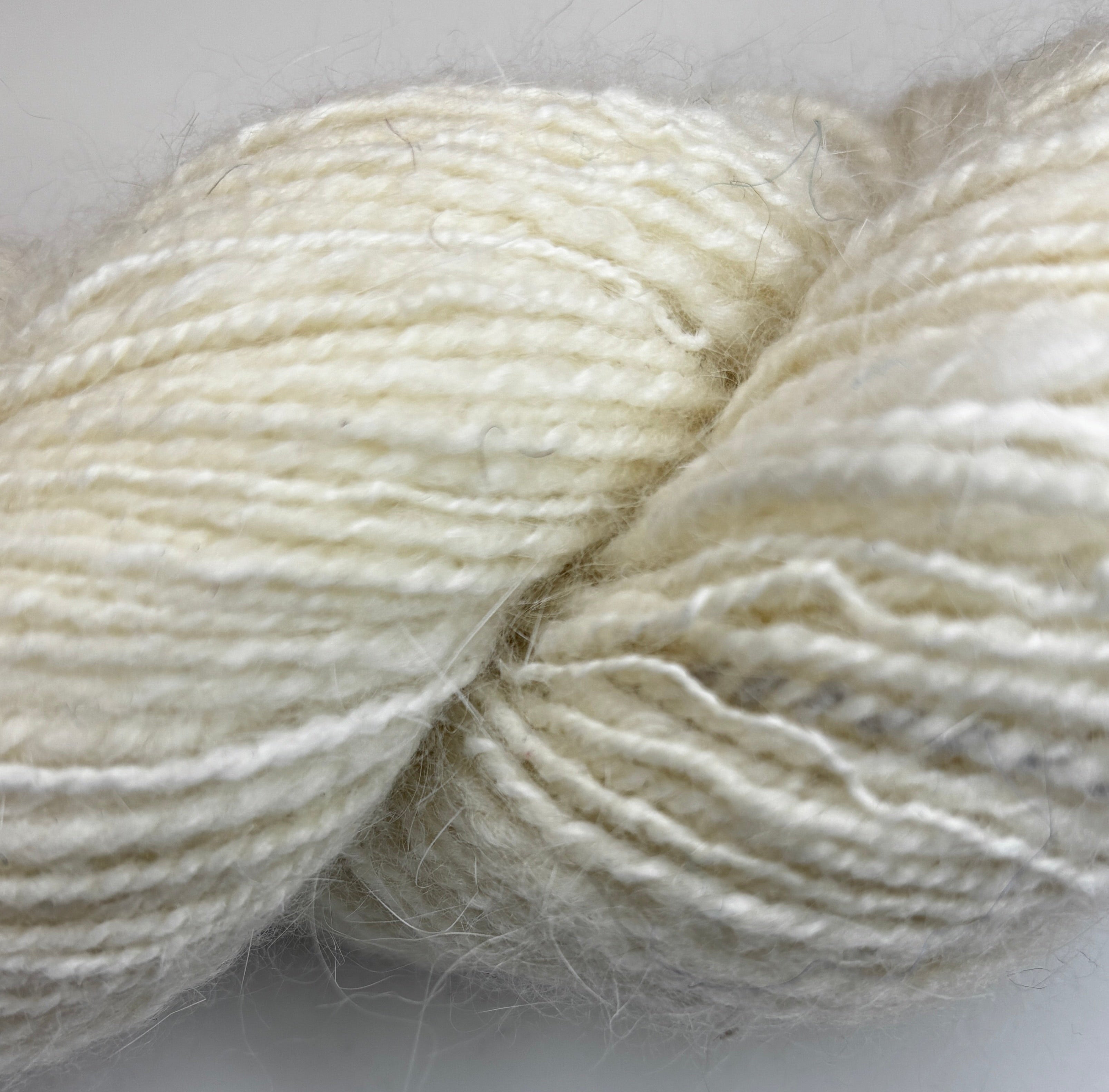 Handspun skein of Angora and Wool Yarn color white