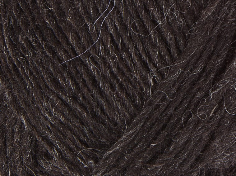A close up photo of black Istex Lettlopi yarn