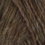 A close up photo of brown Istex Lettlopi yarn