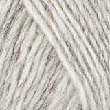 A close up photo of light gray Istex  Lettlopi yarn