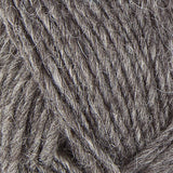 A close up photo of gray Istex Lettlopi yarn