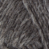 A close up photo of dark gray Istex Lettlopi yarn