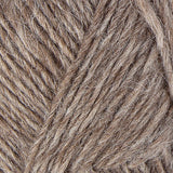A close up photo of light brown Istex Lettlopi yarn