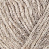 A close up photo of oatmeal colored  Istex Lettlopi yarn
