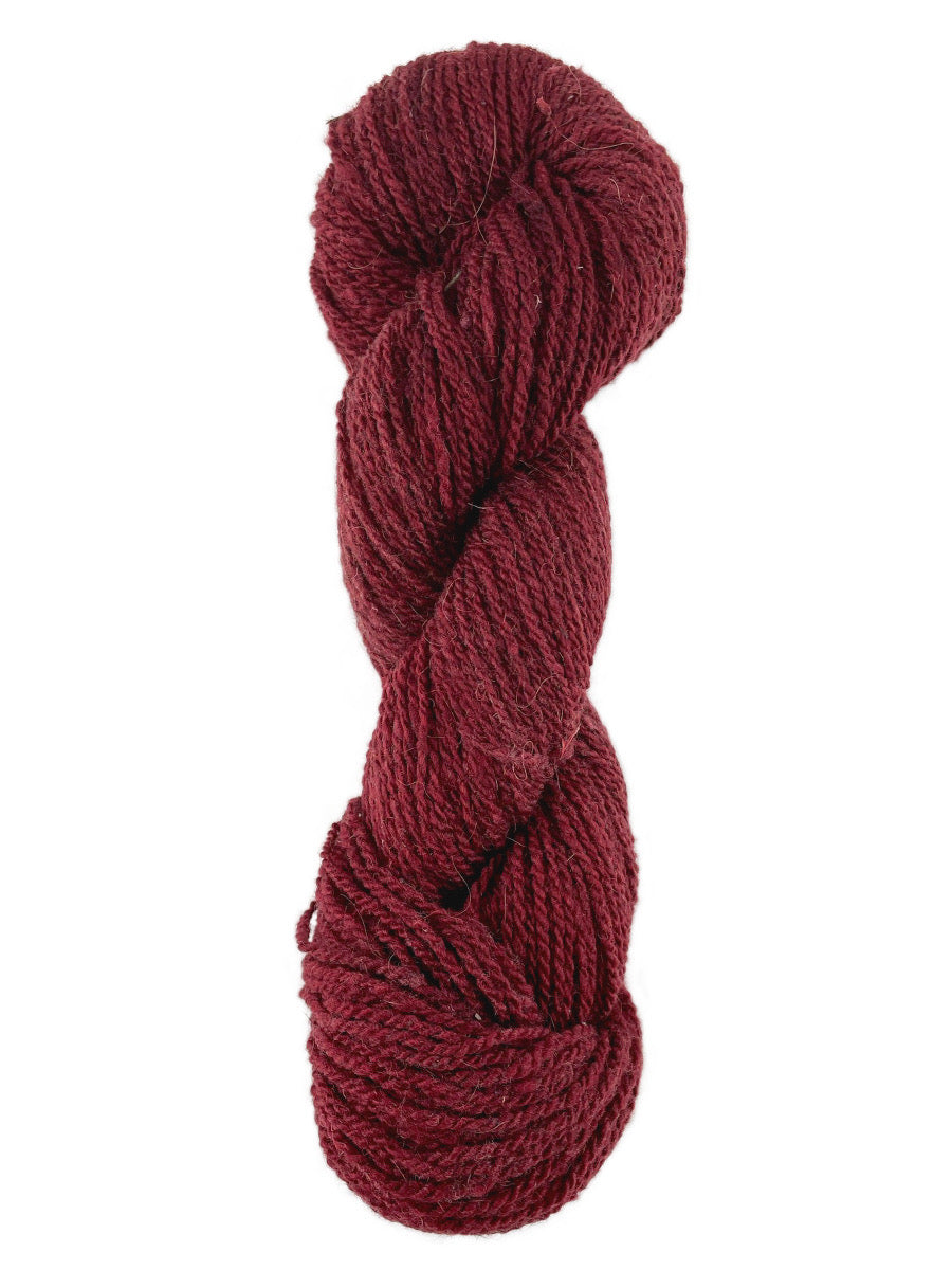 A red skein of Mountain Meadow Wool Mountain Down yarn
