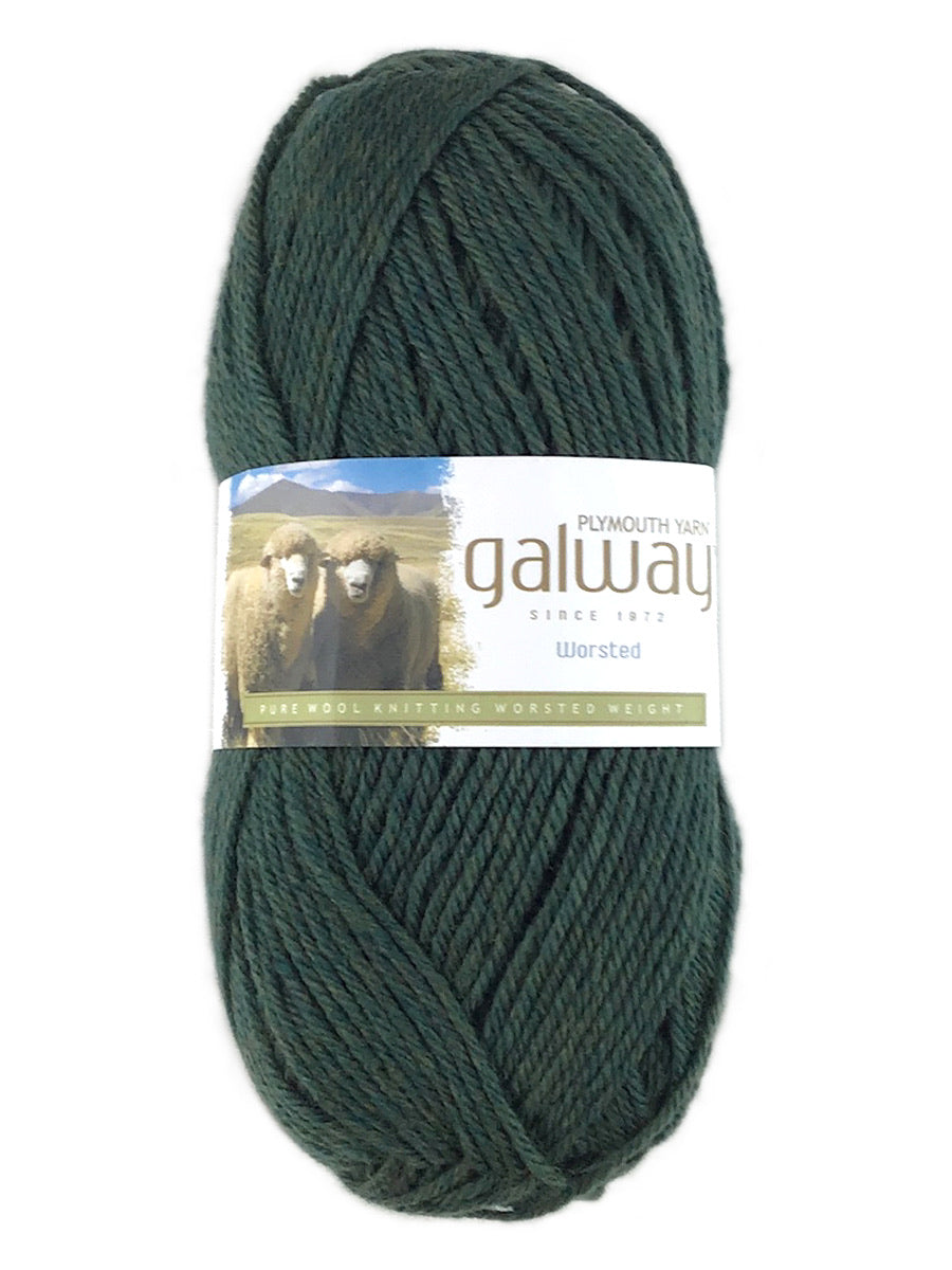 A green skein of Plymouth Galway yarn