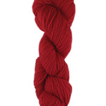 A red skein of Brown Sheep Prairie Spun DK yarn
