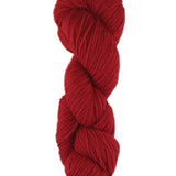 A red skein of Brown Sheep Prairie Spun DK yarn