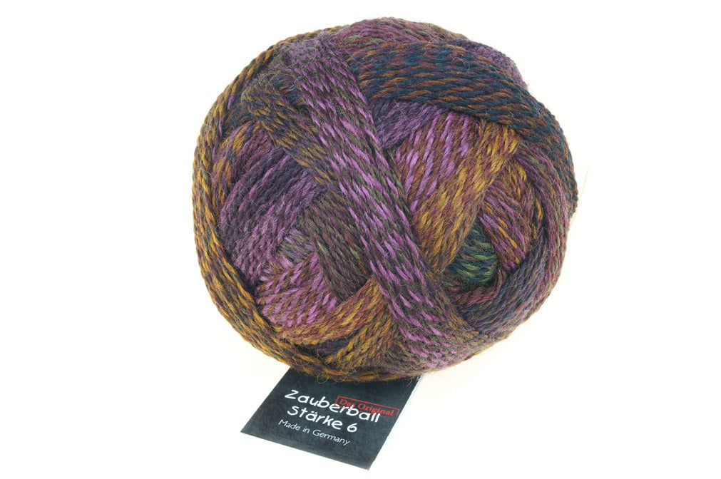 A photo of a colorful ball of Schoppel Zauberball Starke 6 yarn