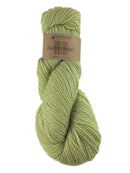 A green skein of Plymouth Homestead yarn