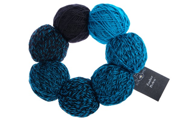 A blue and black set of Schoppel Zauber Perlen yarn balls