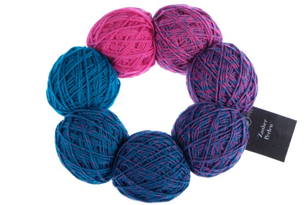 A blue and pink set of Schoppel Zauber Perlen yarn balls