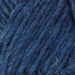 A close up photo of blue Istex Lettlopi yarn
