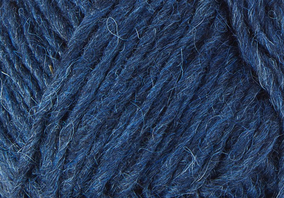 A close up photo of blue Istex Lettlopi yarn
