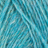 A close up photo of blue Istex Lettlopi yarn