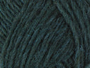 A close up photo of dark green Istex Lettlopi yarn