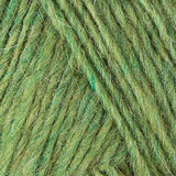 A close up photo of light green Istex Lettlopi yarn