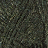 A close up photo of dark green Istex Lettlopi yarn