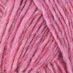 A close up photo of pink Istex Lettlopi yarn