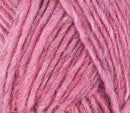 A close up photo of pink Istex Lettlopi yarn