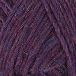 A close up photo of purple Istex Lettlopi yarn