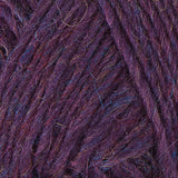 A close up photo of purple Istex Lettlopi yarn