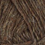 A close up photo of brown Istex Lettlopi yarn
