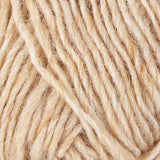 A close up photo of natural cream Istex Lettlopi yarn