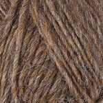 A close up photo of brown Istex Lettlopi yarn