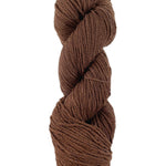 A brown skein of Mountain Meadow Wool Cora yarn