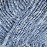 A close up photo of blue Istex Lettlopi yarn