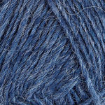 A close up photo of blue Istex Lettlopi yarn